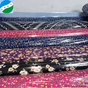 Venta caliente de poliéster masa tela de impresión al por mayor de musgo impreso tela de crepé productos listos stocklot tejido vestido de tela - Product Image 3