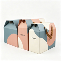 Emballage personnalisé en carton pour vêtements, boîtes cadeaux de luxe en carton avec poignée en corde, imprimées pour la vente en gros