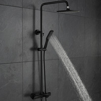 Système de douche mural moderne de luxe noir poli en laiton, chaud/froid, avec cartouche céramique et jets de massage doux effet pluie