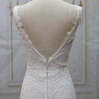 Robe de mariée moderne de luxe avec motif en dentelle et robe de plage joliment décorée d'appliques