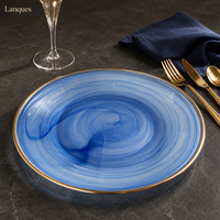 Assiette de présentation en verre bleu tourbillonnant avec bordure dorée ronde, assiette décorative pour la mise en table de mariage