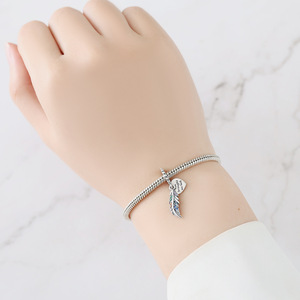 จี้ขนนกสีทองแดงขาวขายดี ดีไซน์เฉพาะตัว หรูหรา สำหรับทำสร้อยข้อมือ DIY สำหรับผู้หญิง - Product Image 6