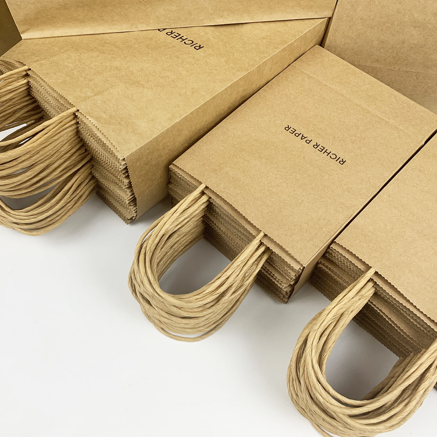 Eco-Friendly Brown Kraft Paper Shopping Gift & Party Bags in Multiple Sizes with Lamination & Digital Printing Handling