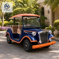 Voiture électrique rétro nostalgique avec phares ronds et sièges beiges pour les promenades, les visites touristiques et les excursions en hôtel