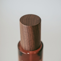 Ensemble de bouteilles en verre à couvercle en noyer personnalisé haut de gamme pot de crème à couvercle en bois foncé emballage en verre personnalisé personnalisé
