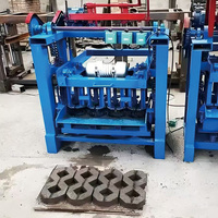 Machine à fabriquer des blocs QTJ4-45 en promotion pour le marché africain, facile à utiliser, haute production pour les petites briqueteries