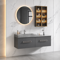 Meuble-lavabo mural gris moderne avec vasque et miroir LED rond pour projets hôteliers et d'appartements