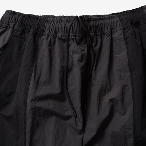 Pantalones de chándal para hombre de diseño OEM 100% de nailon de color sólido con bolsillo, pantalones de chándal cortavientos, pantalones de hombre para hombre - Product Image 4