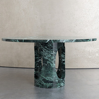 Table de salle à manger ronde en marbre avec base découpée en ellipse, sculptée à la main en pierre massive, pour un intérieur de maison haut de gamme