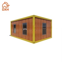 Garage préfabriqué en conteneur, modèle DXH, en acier moderne, prix bas, installation rapide, pour maison individuelle, avec porte à enroulement électrique.