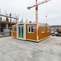 Maison conteneur extensible préfabriquée, bureau de chantier, cadre en acier orange et blanc, logement pour camp de travailleurs, fournisseur d'usine en gros