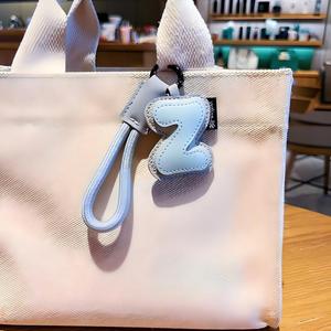Creative Genuine Leather 26 English <b>Alphabet</b> Keychain for Women Minimalist Initial Letter <b>Keyring</b> Bag Charm Small Gift Bulk - Product Image 6