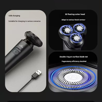 Rasoir électronique 4-en-1 étanche et rechargeable par USB pour hommes Tondeuse à barbe rotative Rasoir électrique pour le visage