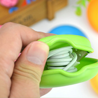 Accessoire électronique créatif en TPR Organiser le fil Organisateur de cordon d'écouteur Mini clip de support de câble Clip de câble d'écouteur