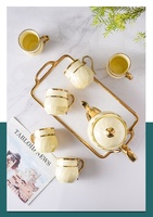 Service à thé de luxe de style nordique, moderne, en céramique dorée peinte à la main, nouveau service créatif de tasses et de carafes à café