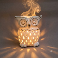 Brûleur d'huile en céramique en gros en forme de hibou pour la décoration intérieure, chauffe-huile personnalisé pour bougie chauffe-plat