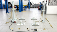 Machine de redressage de châssis et de débosselage pour carrosserie automobile en acier