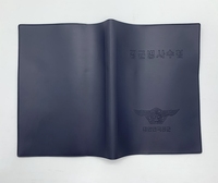 Protège-carnet en PVC souple, imperméable, avec logo en relief