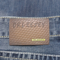 Étiquettes personnalisées en cuir véritable pour vêtements et jeans, avec logo en PP sérigraphié et estampé à chaud, design en cuir de vachette, fabriquées en Chine