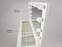 Table de maquillage sans poignée à finition brillante avec plateau en verre, organisateur et miroir à ampoules LED pour l'exportation (vente en gros)