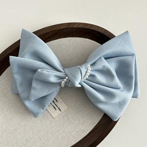 Pince à cheveux coréenne en tissu avec grand nœud perlé, accessoire féminin pour les fêtes - Product Image 3