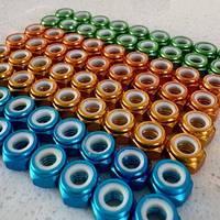 Écrou autobloquant en aluminium coloré avec insert en nylon personnalisé pour fixations de vélos, automobiles et machines