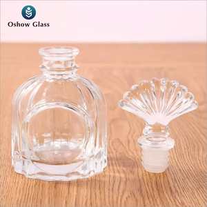 Bán buôn chai tinh dầu/nước hoa thủy tinh tròn cổ điển 50ml 100ml có nắp và hộp - Product Image 5