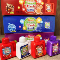 Vente en gros de bonbons en poudre dans une boîte d'emballage saveur pétillante de soda aigre avec goût fruité forme de bouteille bonbons en tablette