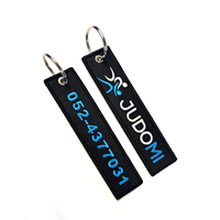 Porte-clés brodés personnalisés avec logo en gros pour souvenirs de voyage, cadeaux de mode et artisanat de jet tags en tissu personnalisés