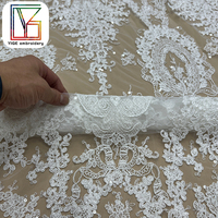 Haute qualité cordon de mariée broderie Sequin Tulle dentelle tissu lourd blanc paillettes brodé maille dentelle tissu pour robe de mariée