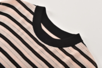 Pull en maille rayé à col rond avec bordure contrastante et détails ajourés pour femme, idéal pour le bureau