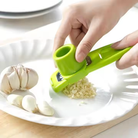 Broyeur d'ail manuel multifonctionnel créatif Gadget de cuisine et outil de pressage de l'ail