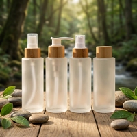 Prix d'usine – Flacon en verre dépoli transparent de 100 ml à épaule plate avec bouchon en bambou pour lotion, sérum, huile essentielle, crème corporelle et crème visage