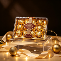 Ensemble de chocolats à la truffe fourrés aux noisettes, emballés dans un coffret doré haut de gamme, RISHDENE, élégante boîte cadeau transparente