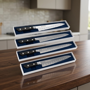Cuchillo de chef de acero inoxidable Seki Japan con mango de plástico, borde serrado, diseño ambidiestro y hoja con diseño de hoyuelos. - Product Image 3
