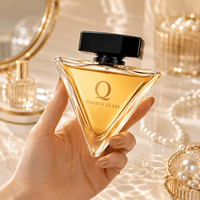 Flacon de parfum en verre triangulaire personnalisé de 50 ml avec couvercle noir pour l'emballage de parfums