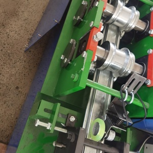 Latte de porte enroulable de vente populaire faisant la lamelle de porte de volet de rouleau de fer formant la machine - Product Image 1