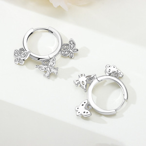 Pendientes de mariposa de latón blanco, resistentes al desgaste, son la elección perfecta para accesorios de fiesta para damas. - Product Image 4