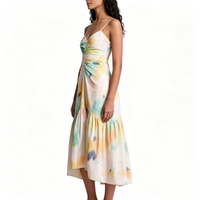 Robe longue multicolore tie-dye pour femme, bretelles spaghetti, buste froncé, jupe à volants, élégante et fluide, idéale pour l'été, la plage ou les invitées de mariage