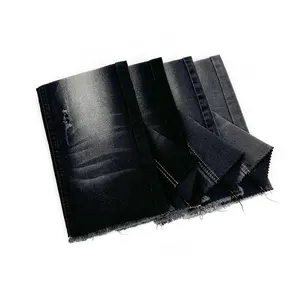 China fábrica de estoque de tecido jeans 10 onças com tecido jeans liso para homens tecido jeans preto para roupas fabricante com atacado