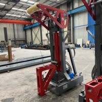 Système de levage portable pour conteneurs, avec grue à flèche hydraulique électrique et tables de plateforme