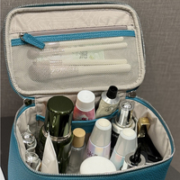 Boîte de rangement de beauté en cuir véritable de luxe, étui à cosmétiques avec chaîne, petite trousse de toilette élégante pour les voyages, sac à maquillage tendance avec poignée