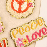 Vente en gros de chenille jaune dessin animé fleur sourire papillon fer sur patchs