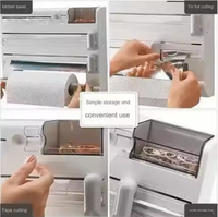 Support mural de rangement pour rouleaux de papier, film alimentaire, film plastique et papier d'aluminium avec coupeur intégré