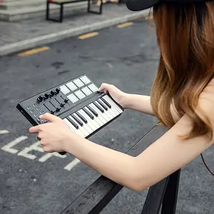 Precio al por mayor portátil Mini Piano 25-Key USB Keyboard Drum Pad MIDI Controller Keyboard