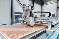 Machine de nesting CNC industrielle à quatre processus avec chargement/déchargement automatique et tête de scie pour la production d'armoires de cuisine