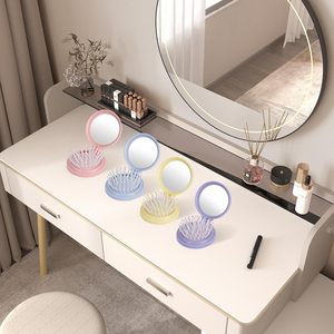 Peigne pliant mini de couleur unie à bas prix, brosse à cheveux de poche, peigne de voyage rond à coussin d'air escamotable avec miroir - Product Image 2
