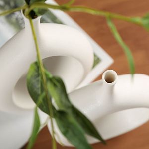 Jarrón de Flores Redondo Hueco con Diseño Artístico de Partículas Escarchadas - Product Image 4