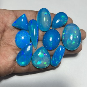 โอปอลเอธิโอเปียแท้ พลอยธรรมชาติ หลายสี หลายประกาย ทรงคาโบชอง สีฟ้าไพรบา คุณภาพเยี่ยม สำหรับทำเครื่องประดับ - Product Image 3