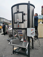 Mélangeur vertical automatique industriel en acier inoxydable pour aliments pour volailles, capacité 1 tonne/h, granulométrie des granulés 0,5-2 mm, haute tension 220/380V